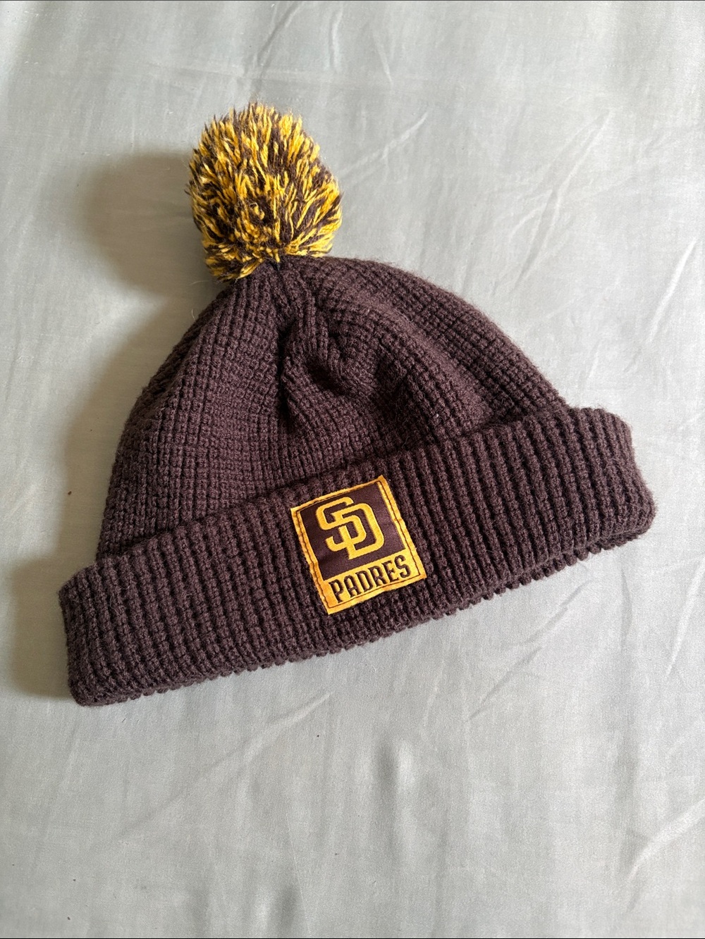 cotopaxi Kids Pom Beanie - Brown with Yellow Pom